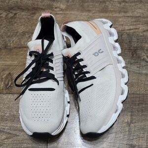 On Running Women's Sneakers in Cream with Pink Accents and Black Laces